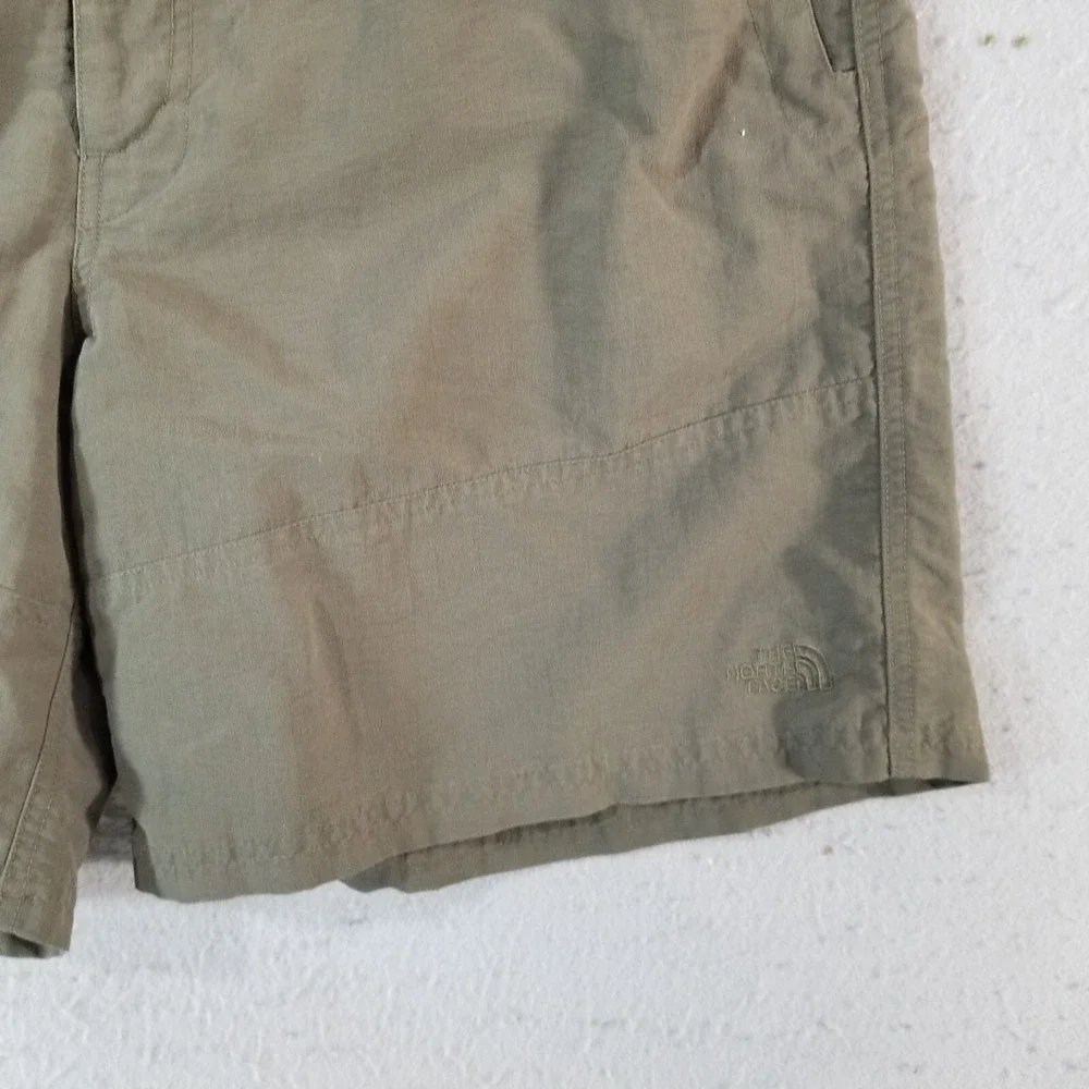 The North Face hiking shorts men's 38x8 khaki green outdoor security pocket